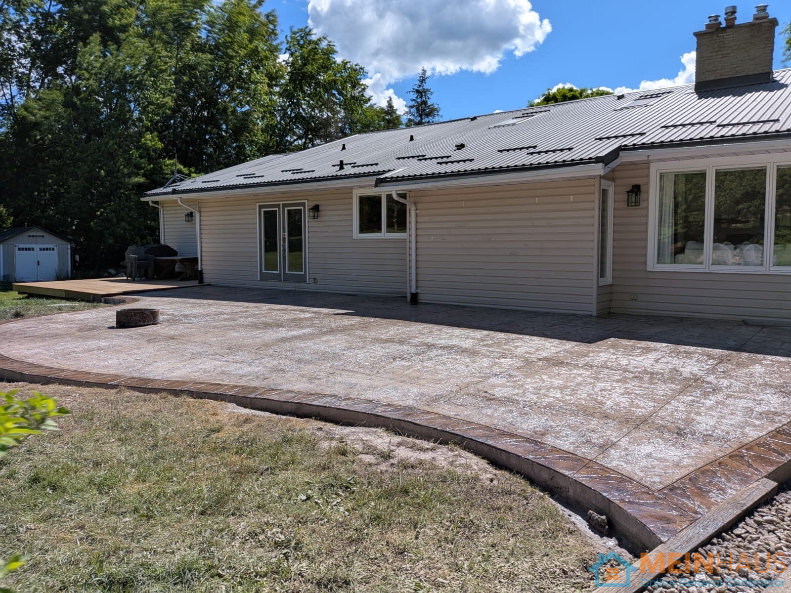 Concrete patio, front step and firepit — after